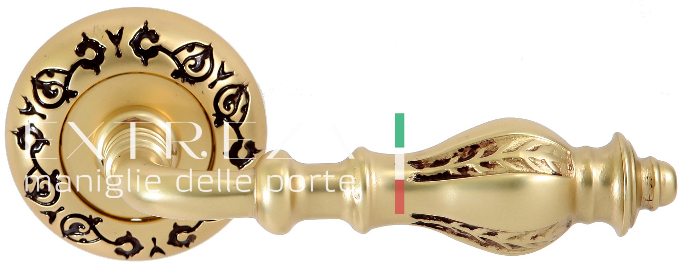 Ручка дверная Extreza EVITA (Эвита) 301 на розетке R04 французское золото + коричневый F59