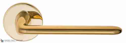 Дверная ручка на круглом основании Fratelli Cattini "FEO" 7FS-OLV полированная латунь