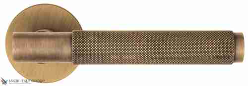 Дверная ручка на круглом основании Fratelli Cattini "UNA X" 7FS-BY матовая бронза