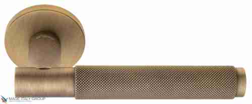 Дверная ручка на круглом основании Fratelli Cattini "UNA X" 7FS-BY матовая бронза