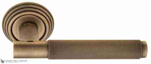 Дверная ручка на круглом основании Fratelli Cattini "UNA X" D8-BY матовая бронза