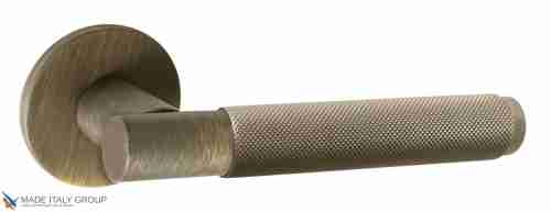 Дверная ручка на круглом основании Fratelli Cattini "UNA X" 7FS-BY матовая бронза