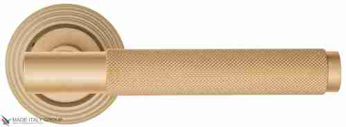 Дверная ручка на круглом основании Fratelli Cattini "UNA X" D8-BS матовая латунь