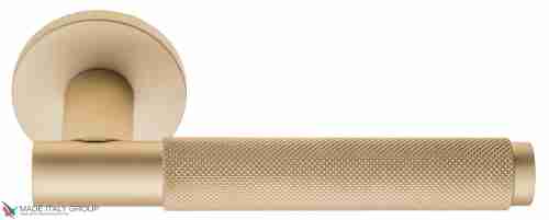 Дверная ручка на круглом основании Fratelli Cattini "UNA X" 7FS-BS матовая латунь